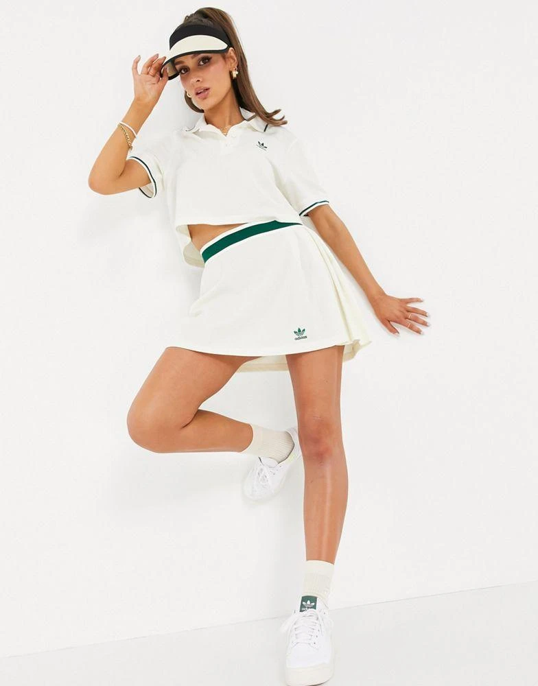 adidas Originals adidas Originals 'Tennis Luxe' logo pleated skirt in off white 1