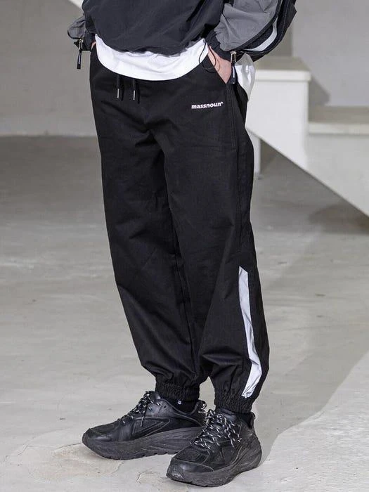 商品MASSNOUN|Logo Section 3M Line Jogger Pants Black,价格¥771,第2张图片详细描述