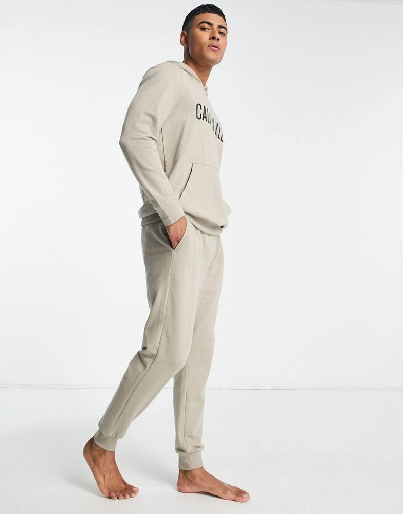 商品Calvin Klein|Calvin Klein co-ord lounge jogger with contrast waistband in oatmeal,价格¥583,第1张图片