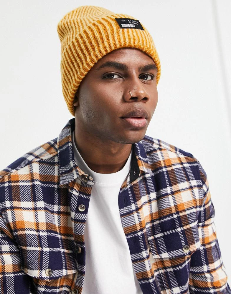 商品ASOS|ASOS DESIGN rib beanie with deep turn up in two tone mustard and white,价格¥59,第1张图片