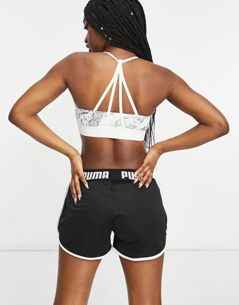 商品Puma|Puma Train Castlerock low impact bra top in white,价格¥113,第2张图片详细描述