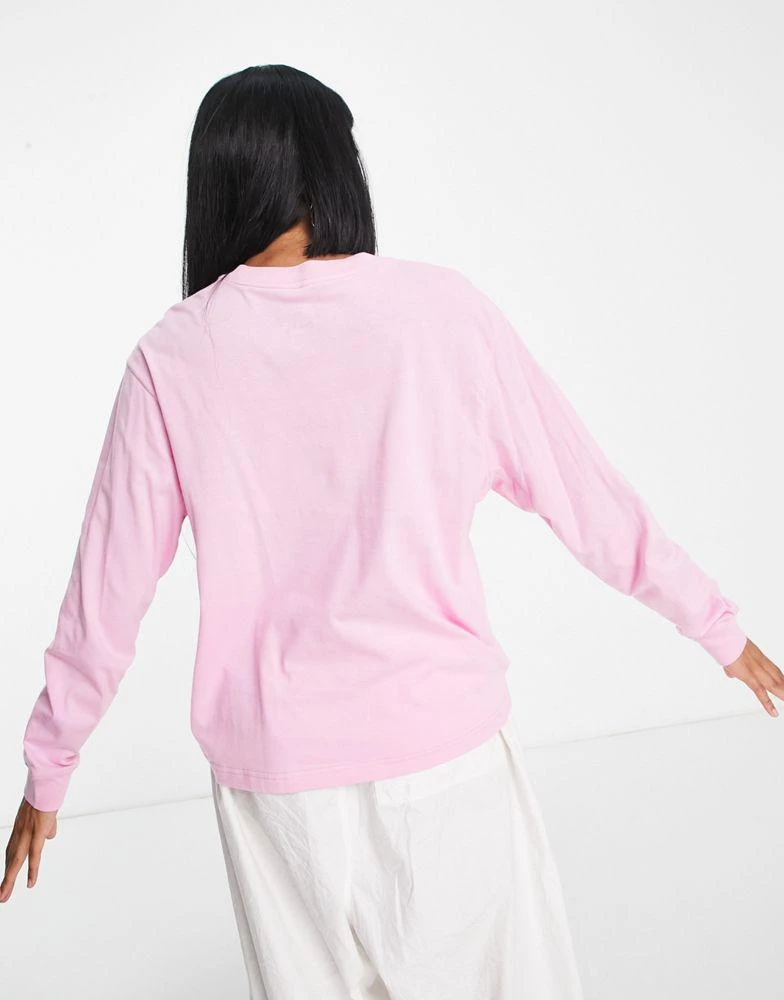 商品NIKE|Nike sparkle swoosh graphic logo long sleeve t-shirt in pink,价格¥367,第2张图片详细描述