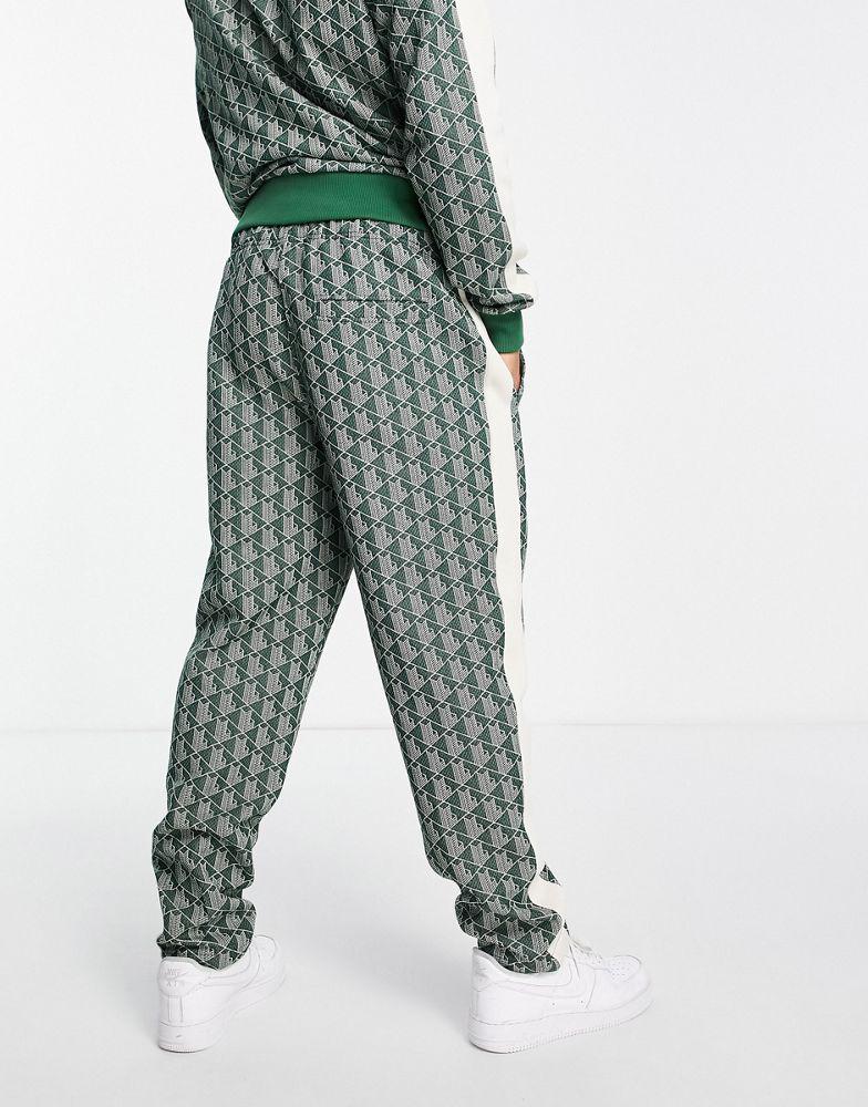 Lacoste all over print taped track bottoms in green商品第2张图片规格展示