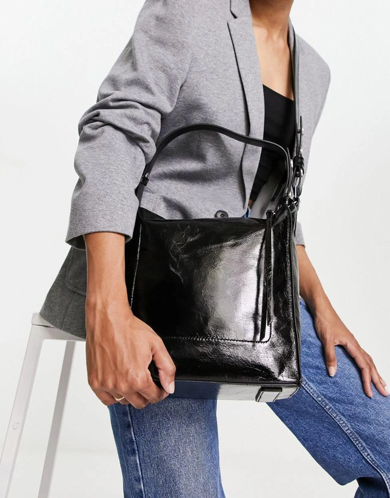 商品ALL SAINTS|AllSaints Kita crossbody bag in patent black,价格¥1809,第2张图片详细描述