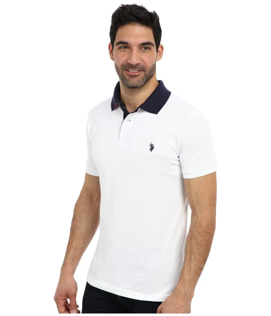 商品U.S. POLO ASSN.|Slim Fit Solid Pique Polo w/ Contrast Color Striped Under Collar,价格¥253,第2张图片详细描述