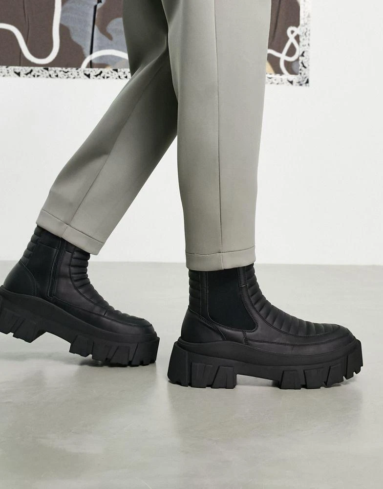 商品ASOS|ASOS DESIGN chelsea calf boots on chunky sole in black faux leather with padded detail,价格¥337,第3张图片详细描述