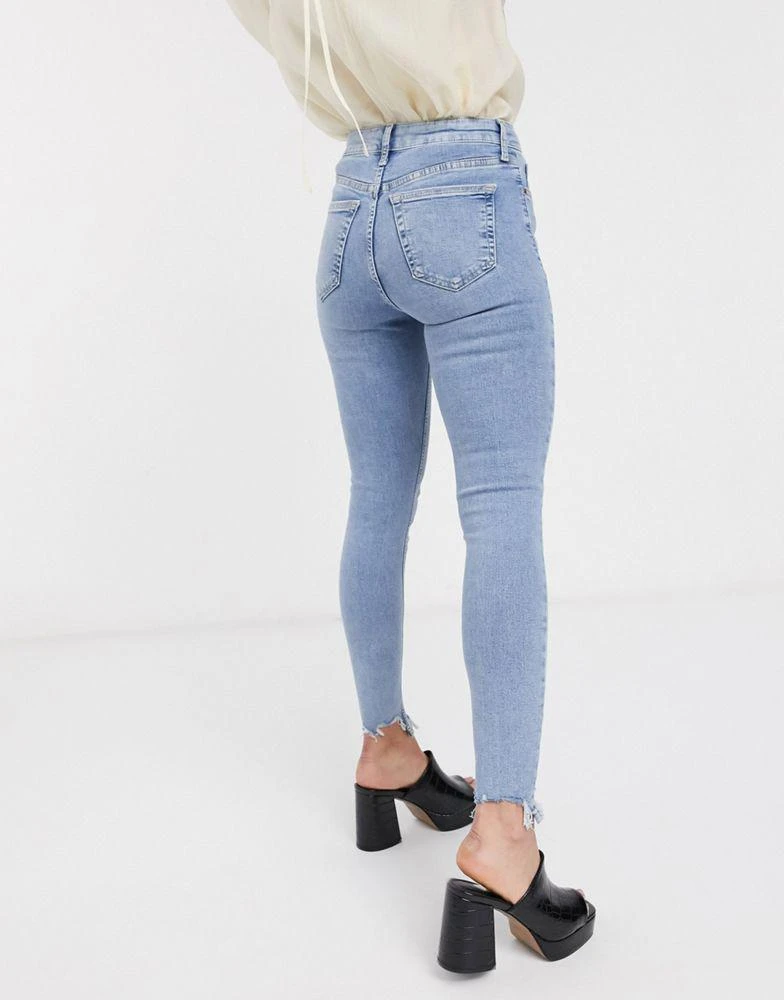 商品Topshop|Topshop Jamie jeans with jagged hem detaling in bleach wash,价格¥224,第2张图片详细描述