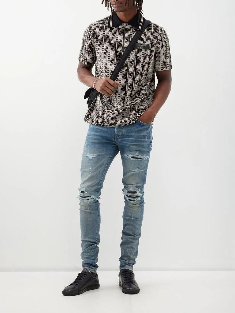 商品AMIRI|MX1 distressed slim-leg jeans,价格¥5311,第2张图片详细描述