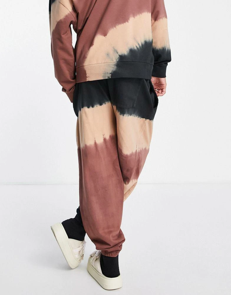 商品ASOS|ASOS DESIGN co-ord oversized joggers in brown with tie dye details,价格¥187,第2张图片详细描述