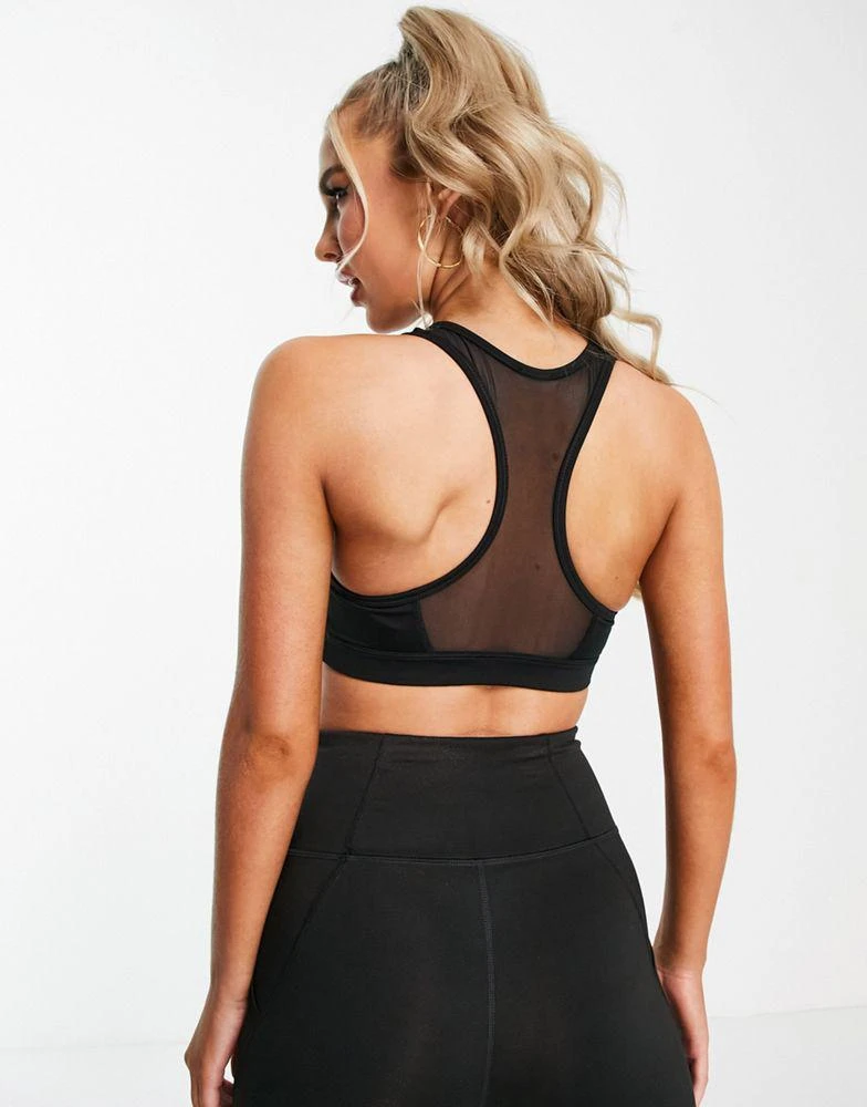 商品Puma|Puma Training 4Keeps mid support sports bra in black,价格¥114,第2张图片详细描述