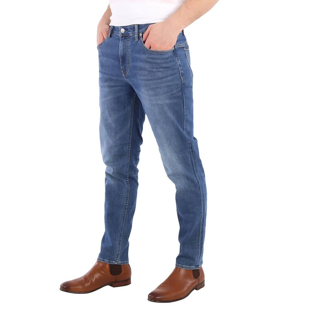 商品Calvin Klein|Calvin Klein Men's Mid Blue Climate Tech Body Taper Denim Jeans, Waist Size 36",价格¥563,第2张图片详细描述