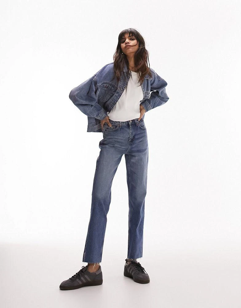 商品Topshop|Topshop mid rise straight jeans with raw hem in mid blue,价格¥285,第2张图片详细描述