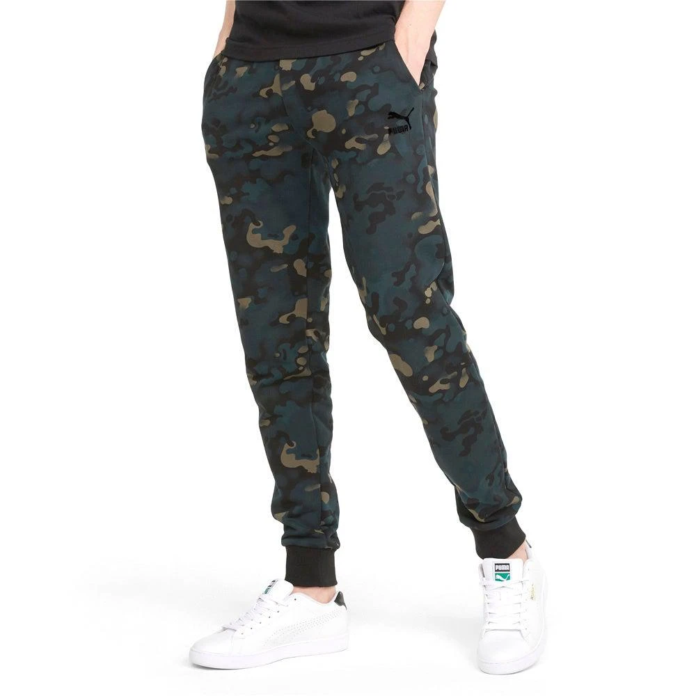 商品Puma|Classics Graphics Camo AOP Sweatpants,价格¥265,第1张图片详细描述