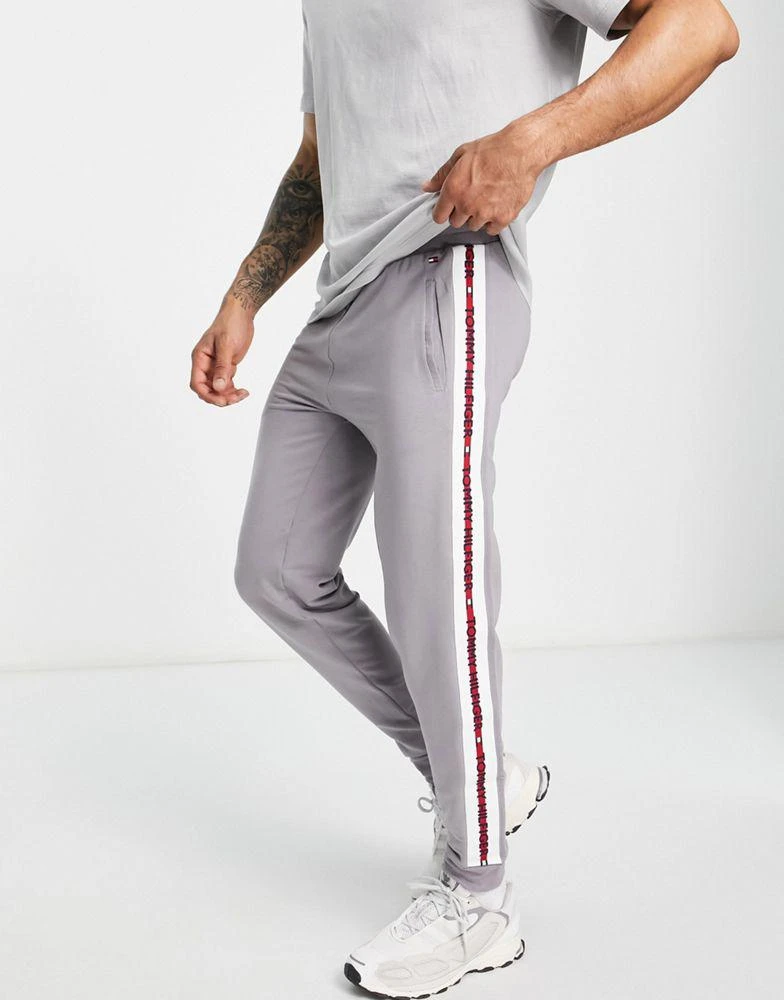 商品Tommy Hilfiger|Tommy Hilfiger exclusive to ASOS flag joggers in washed grey,价格¥373,第1张图片