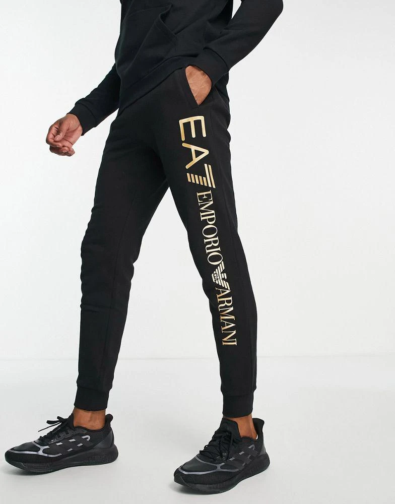 商品EA7|Armani EA7 large gold side logo joggers in black,价格¥512,第1张图片