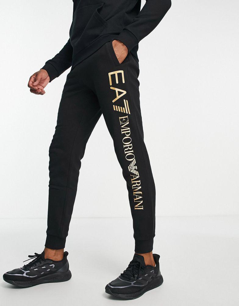 商品EA7|Armani EA7 large gold side logo joggers in black,价格¥823,第1张图片