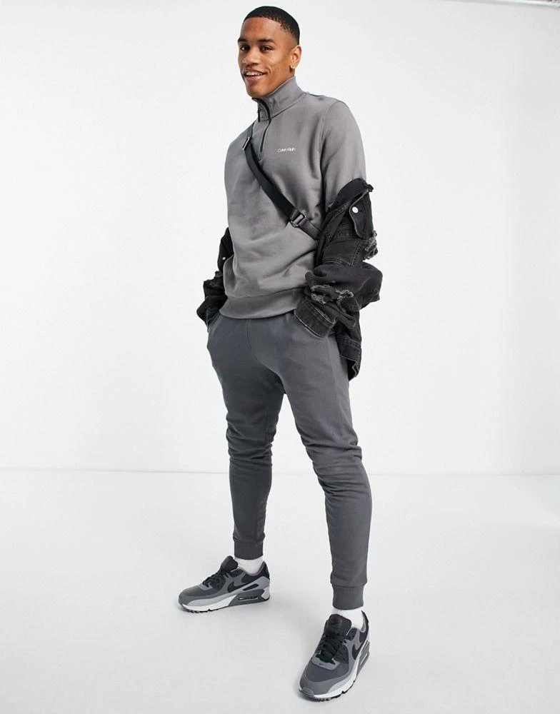 商品Calvin Klein|Calvin Klein small chest logo half zip sweatshirt in grey,价格¥530,第4张图片详细描述