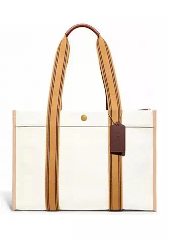 商品Coach|Signature Canvas Spin Tote,价格¥1107,第1张图片