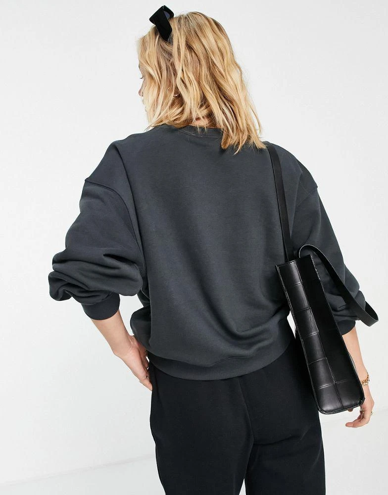 商品Adidas|adidas Originals '80's Aerobic' oversized sweatshirt with trefoil in black,价格¥552,第2张图片详细描述