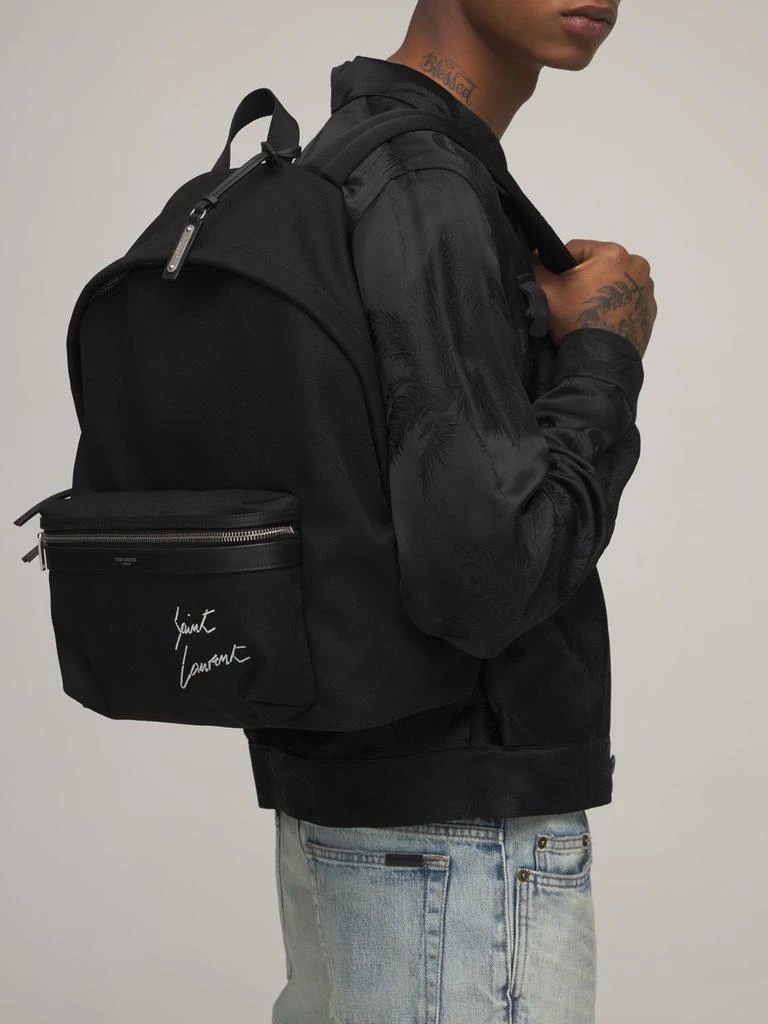 商品Yves Saint Laurent|Embroidered Detail Canvas Backpack,价格¥10875,第2张图片详细描述