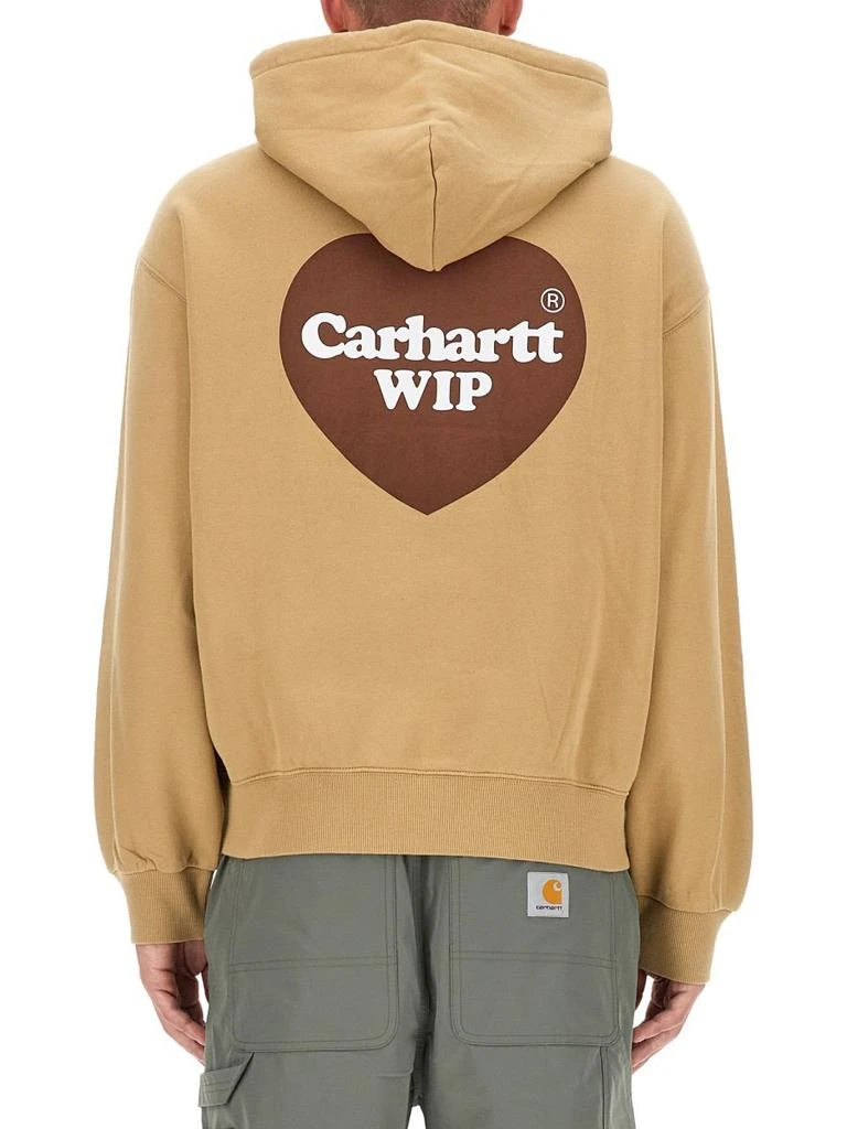 商品Carhartt WIP|Carhartt WIP Logo Printed Drawstring Hoodie,价格¥974,第2张图片详细描述