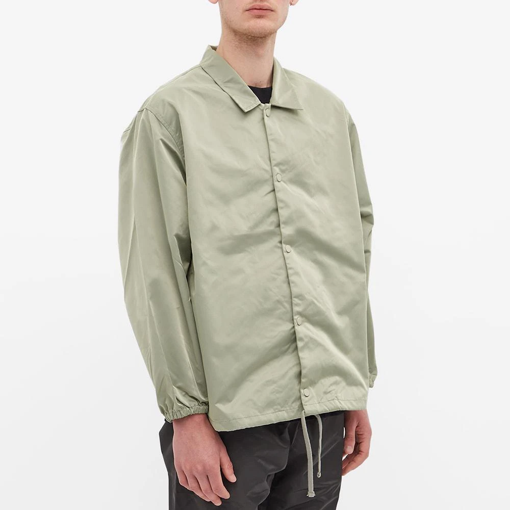 商品Essentials|Fear of God ESSENTIALS ESS Logo Coach Jacket - Seafoam,价格¥1388,第2张图片详细描述