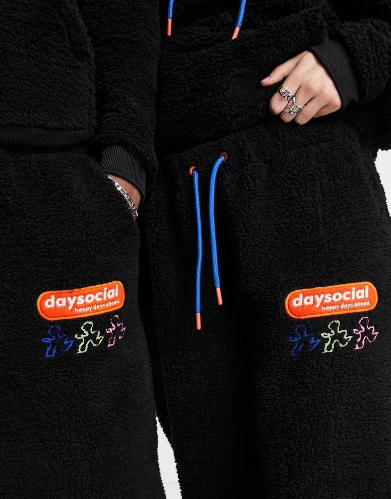 商品ASOS|ASOS Daysocial unisex co-ord relaxed joggers in teddy borg with back embroidery in black,价格¥299,第4张图片详细描述