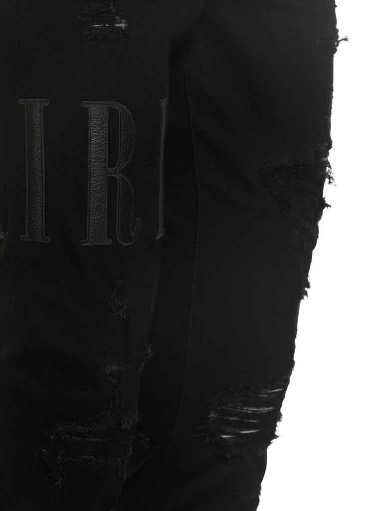 商品AMIRI|Leather Logo Cotton Denim Jeans,价格¥8701,第5张图片详细描述