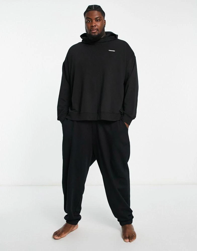 商品Calvin Klein|Calvin Klein Plus co-ord lounge hoodie in black,价格¥397,第3张图片详细描述
