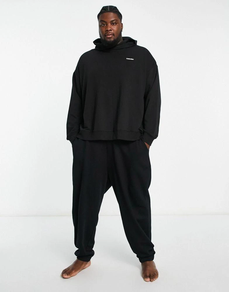 商品Calvin Klein|Calvin Klein Plus co-ord lounge hoodie in black,价格¥404,第3张图片详细描述