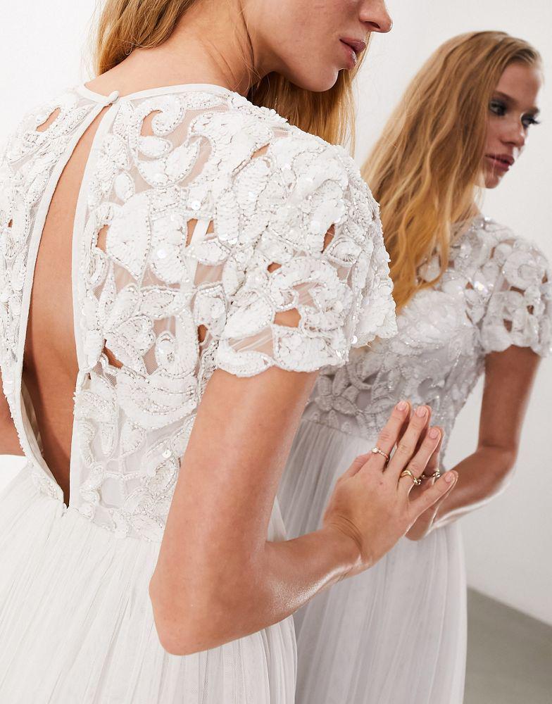 Shop ASOS DESIGN Isabelle sequin cutwork bodice maxi wedding dress with cap sleeve in on Sale at BeyondStyle Get 16% Off ASOS DESIGN Isabelle sequin cutwork bodice maxi wedding dress with Shop ASOS DESIGN Isabelle sequin cutwork bodice maxi wedding dress with cap sleeve in on Sale at BeyondStyle Get 16% Off ASOS DESIGN Isabelle sequin cutwork bodice maxi wedding dress with