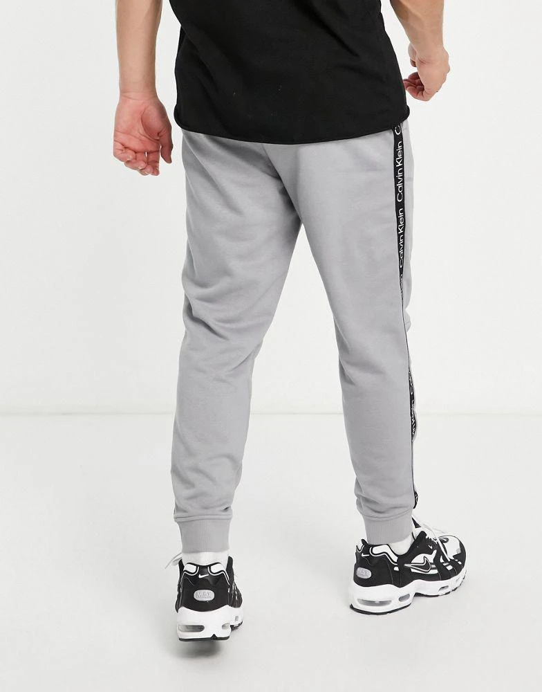 商品Calvin Klein|Calvin Klein Performance taping joggers in grey,价格¥454,第2张图片详细描述