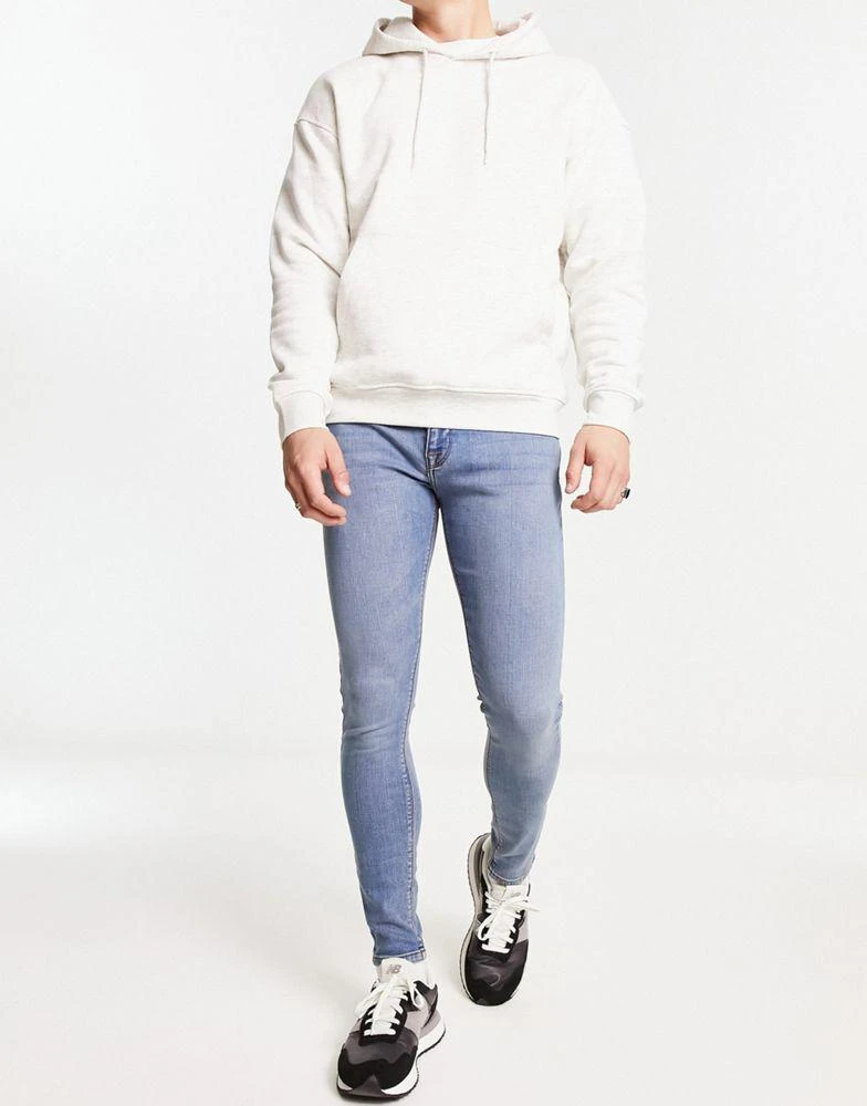商品ASOS|ASOS DESIGN power stretch jeans in light wash blue,价格¥109,第1张图片