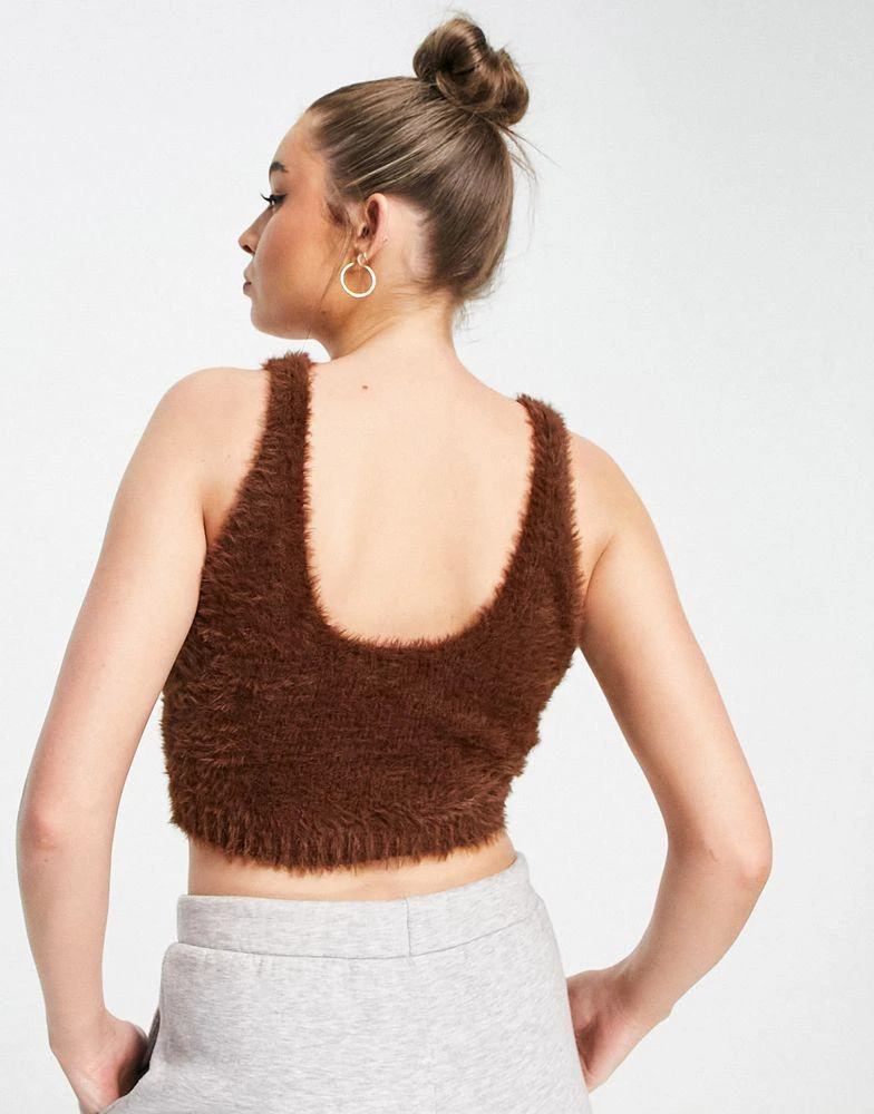 商品Reebok|Reebok cosy fluffy bralette in brown,价格¥94,第4张图片详细描述