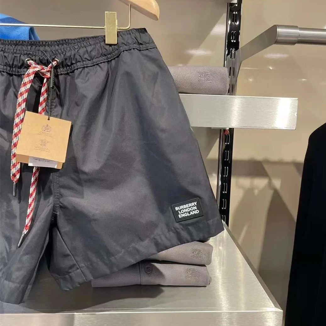 BURBERRY/博柏利 男士黑色纤维微标贴片条纹抽绳游泳短裤80226381 商品