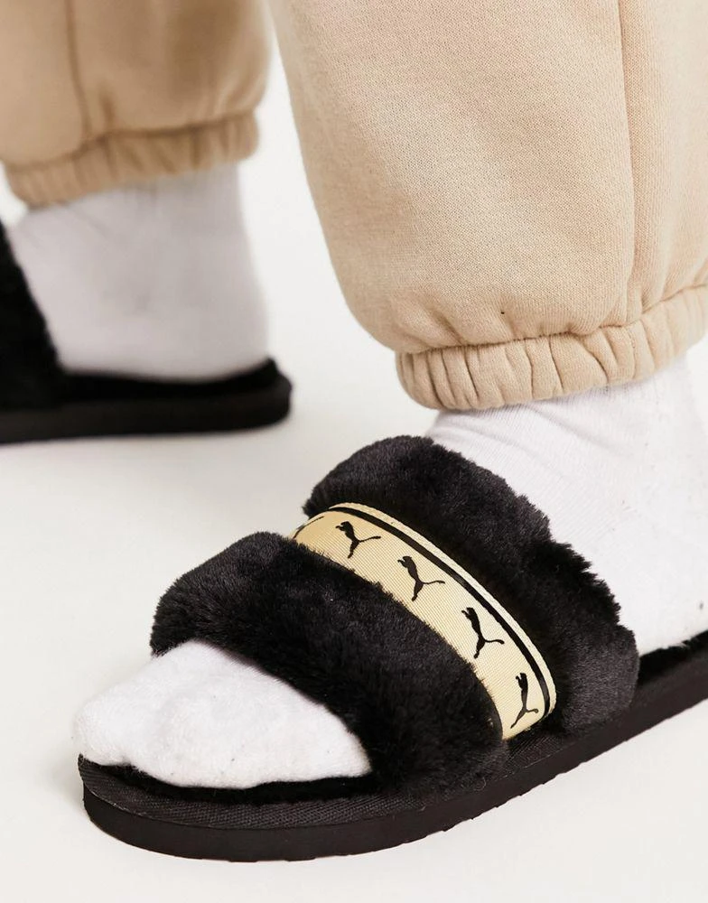 商品Puma|Puma Fluff slider slippers in black and gold,价格¥273,第2张图片详细描述