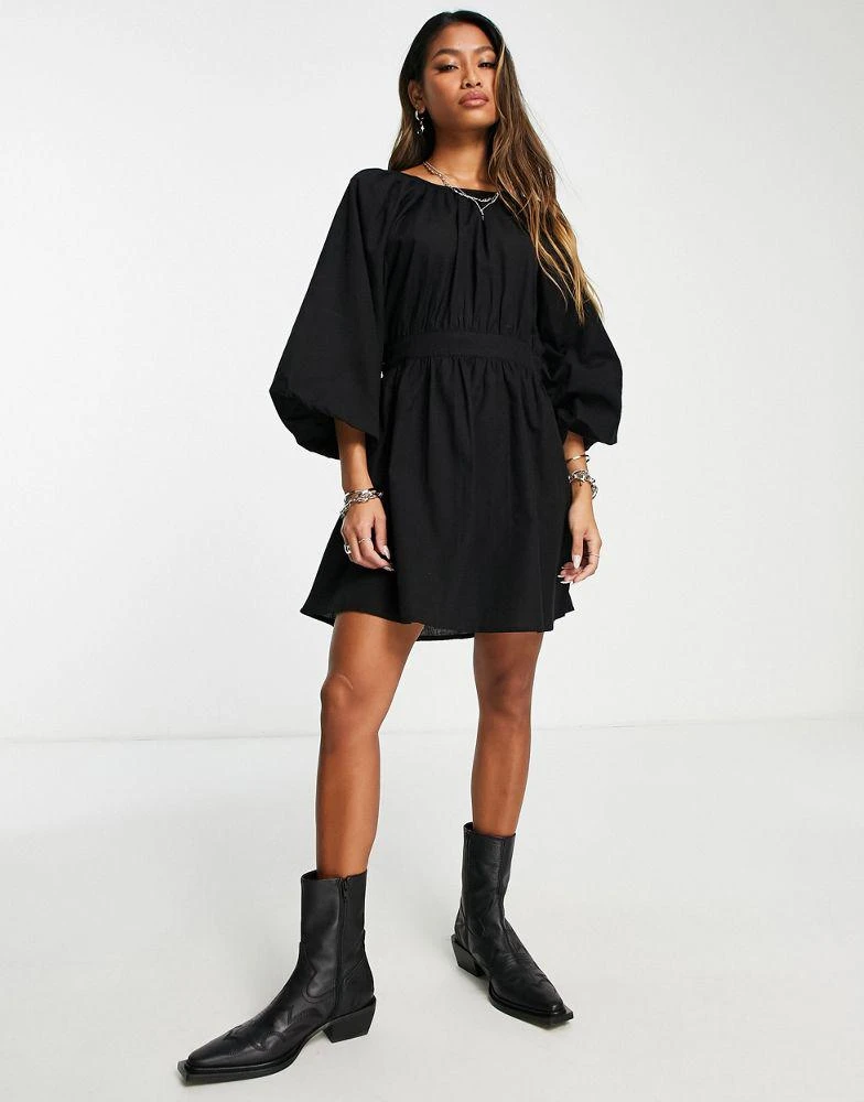 商品HYPE|Violet Romance puff sleeve tiered mini dress in black,价格¥119,第3张图片详细描述