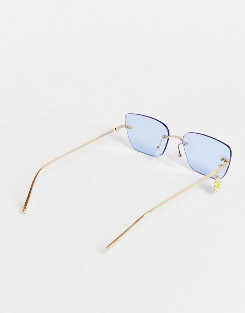 商品ASOS|ASOS DESIGN rimless rectangle sunglasses with flower charm in blue,价格¥105,第2张图片详细描述