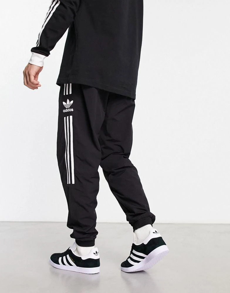 商品Adidas|adidas Originals adicolor lock up track joggers in black,价格¥529,第2张图片详细描述