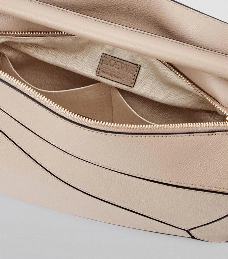 Leather Puzzle Top-Handle Bag 商品