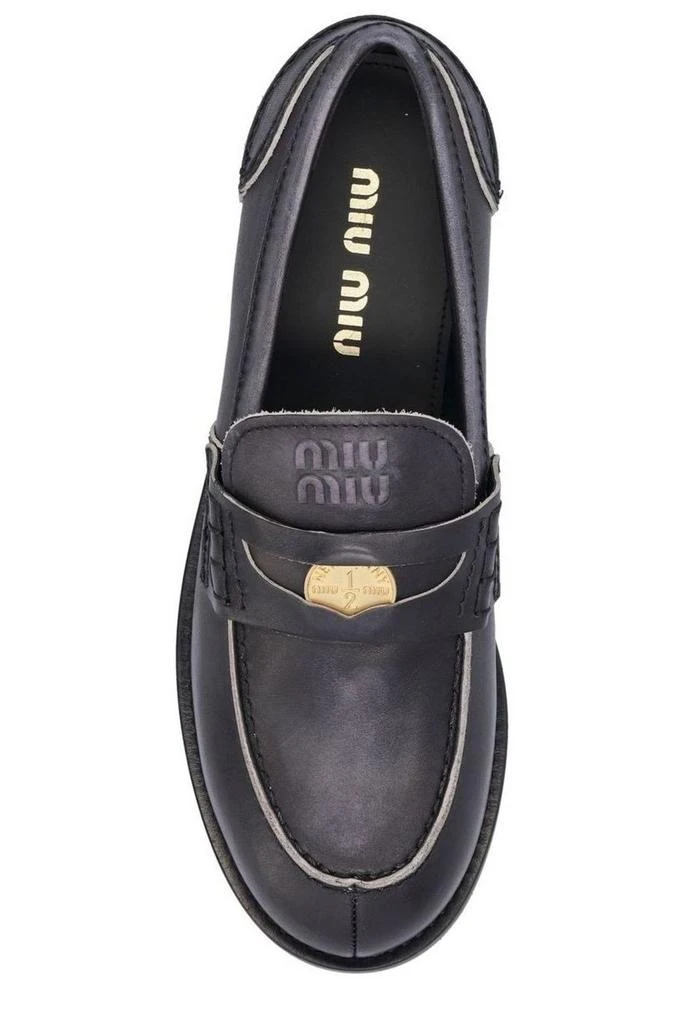 商品Miu Miu|Miu Miu Logo Detailed Slip-On Penny Loafers,价格¥6822,第4张图片详细描述