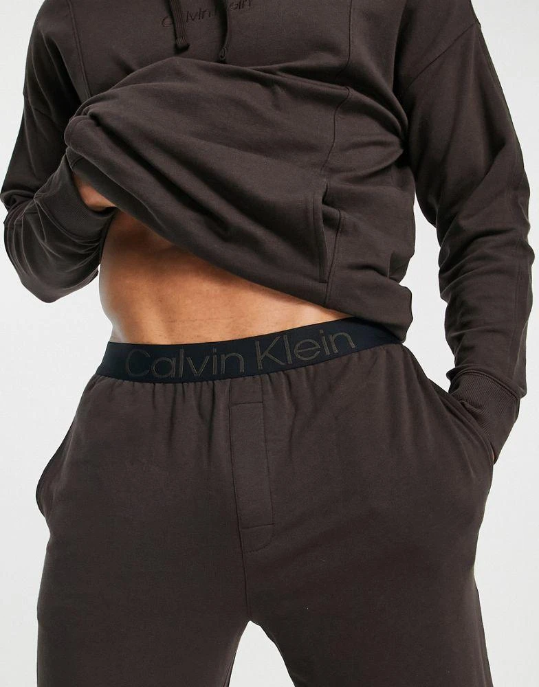 商品Calvin Klein|Calvin Klein contrast waistband lounge co-ord  joggers in brown,价格¥431,第2张图片详细描述