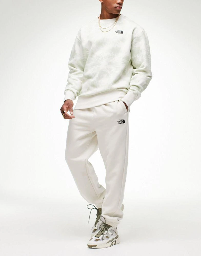 商品The North Face|The North Face Oversized Essential joggers in cream Exclusive at ASOS,价格¥360,第3张图片详细描述