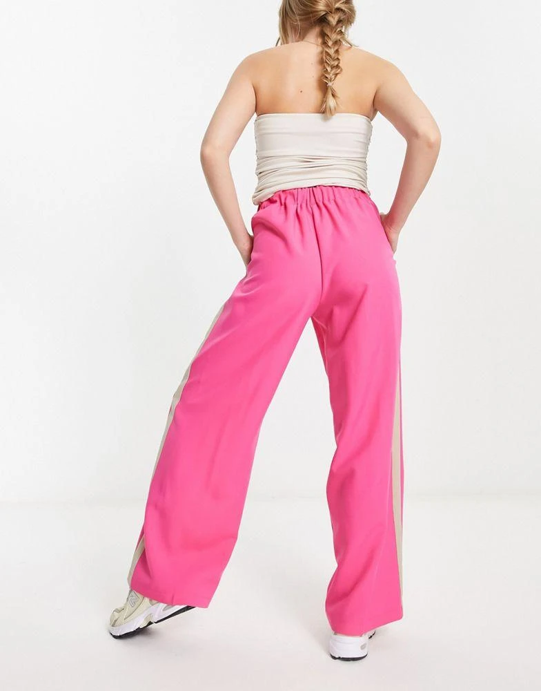 商品ASOS|ASOS DESIGN elastic waist side stripe trouser in pink with stone stripe,价格¥137,第2张图片详细描述