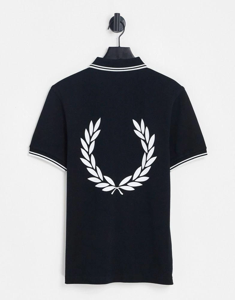 商品Fred Perry|Fred Perry back print polo shirt exclusive to ASOS in black,价格¥634,第1张图片