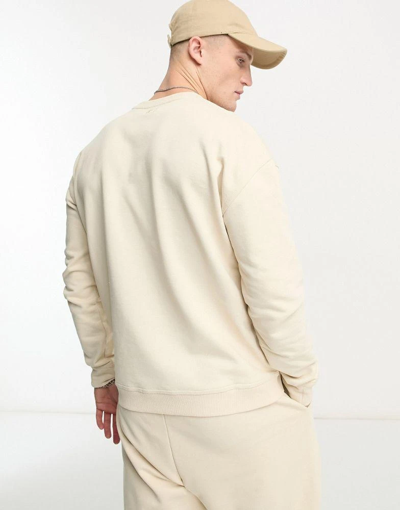 商品Fila|Fila unisex Trev sweatshirt with seam detail in oatmeal,价格¥372,第2张图片详细描述