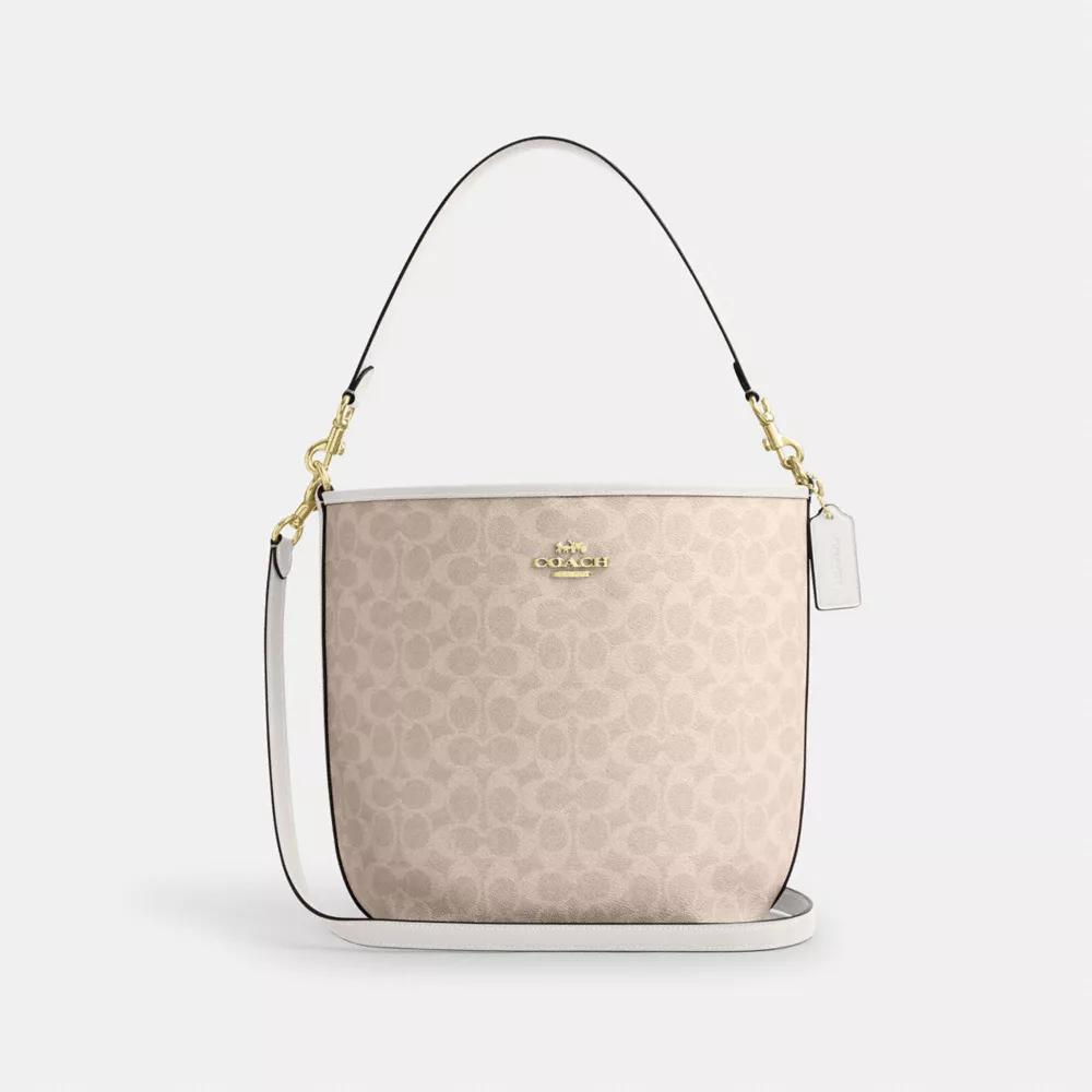 【国内発送】coach＊City Bucket Bag In Signature Canvas Coach City Bucket Bag In Signature Canvas With Bow Print