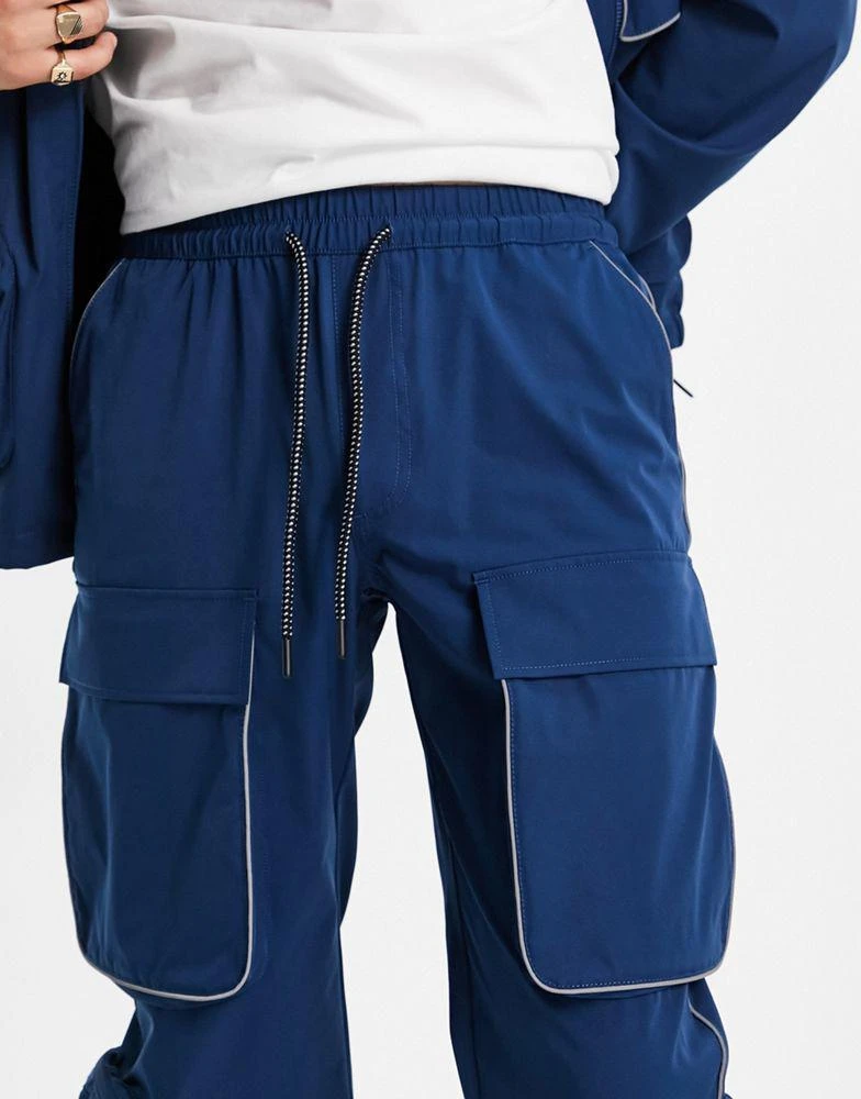 商品Topman|Topman relaxed nylon four pocket co-ord cargo trousers in blue,价格¥245,第3张图片详细描述