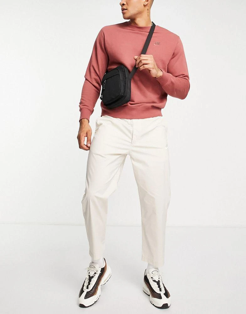 商品NIKE|Nike Sport Essentials cropped woven straight leg sneaker pants in stone,价格¥312,第3张图片详细描述