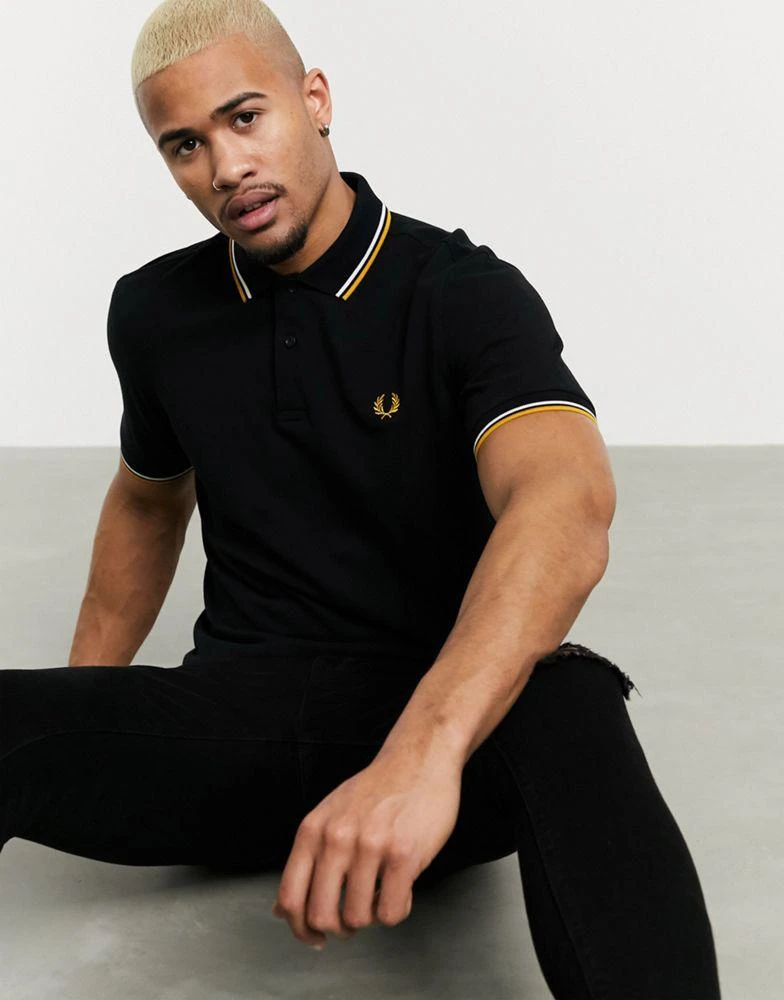 商品Fred Perry|Fred Perry twin tipped logo polo in black/white/gold,价格¥560,第1张图片